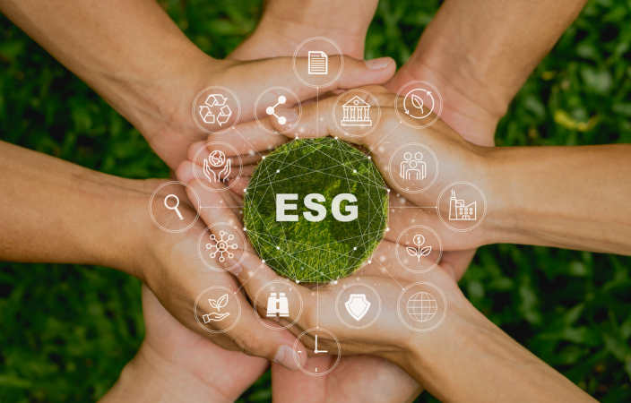 ESG icon concept in the people hand for environmental, social, and governance by using technology of renewable resources to reduce pollution and carbon emission . in sustainable and ethical business on the Network connection