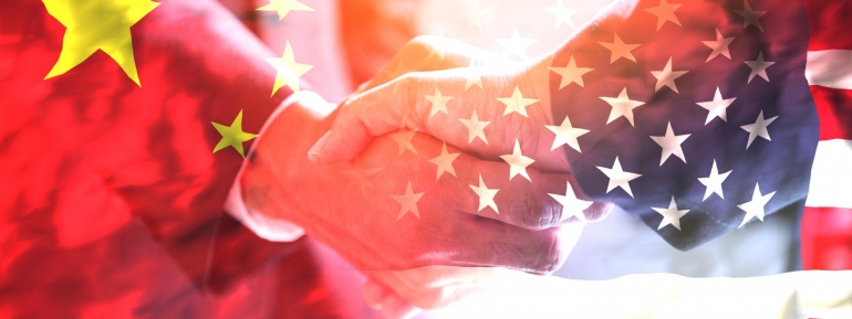 image for handshake with China and America flag at the background