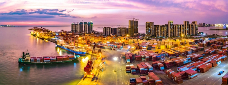 image of city and port at night time