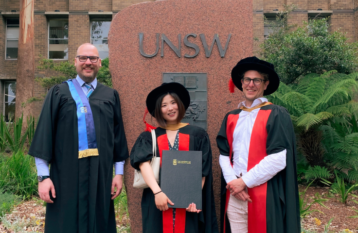 Dan Xie graduation photo with supervisors