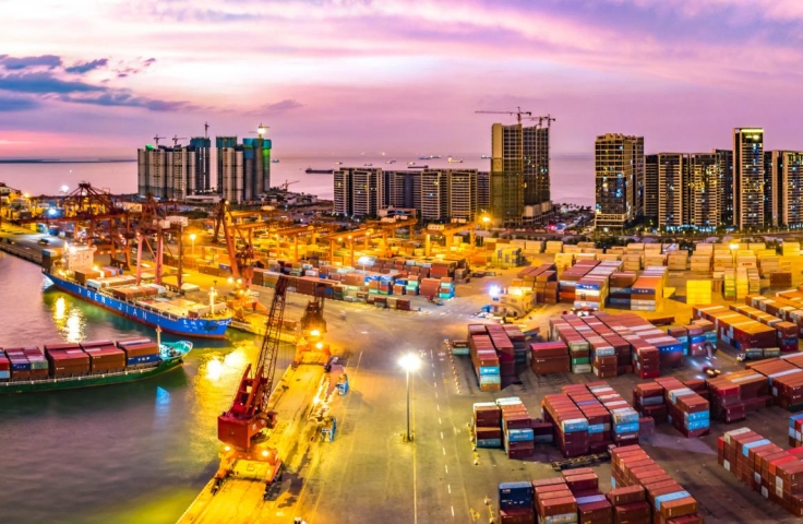 image of city and port at night time