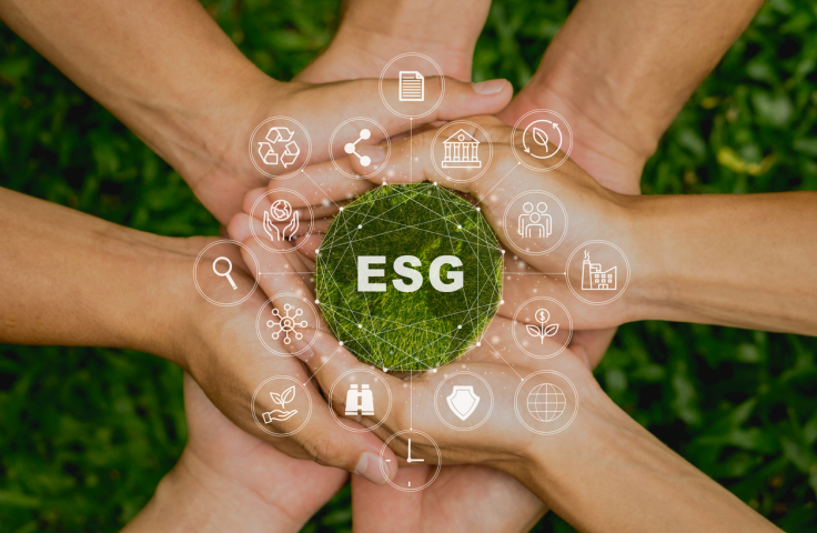 ESG icon concept in the people hand for environmental, social, and governance by using technology of renewable resources to reduce pollution and carbon emission . in sustainable and ethical business on the Network connection