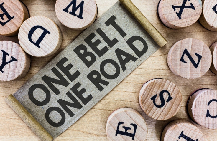 'One Belt One Road' slogan on scrabble board 