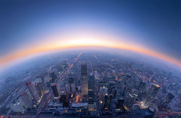 A panorama of a capital city at sunset 